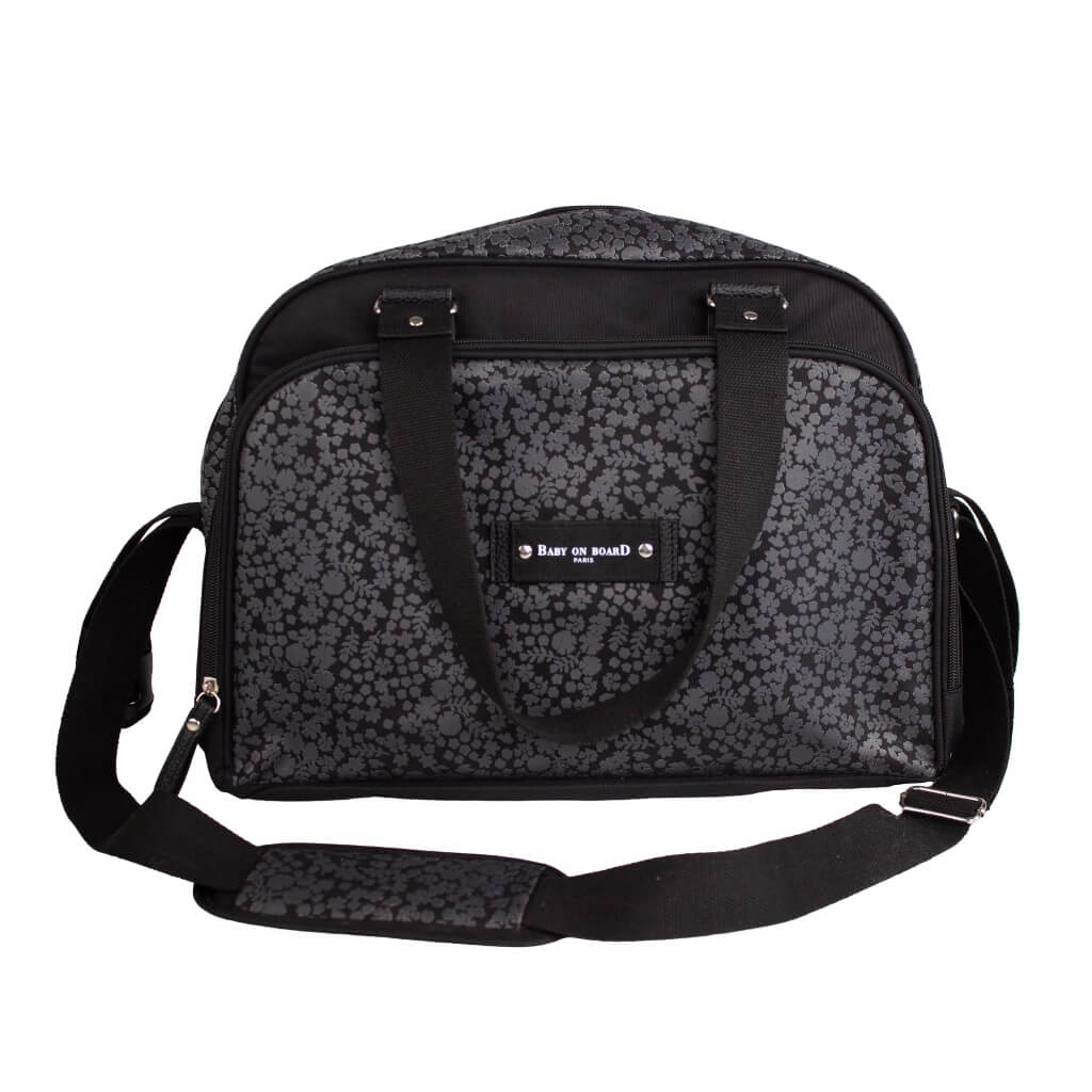 Sac à langer Simply liberty noir Baby on Board avec imprimé discret, poignées solides et bandoulière rembourrée pour un confort optimal en déplacement.