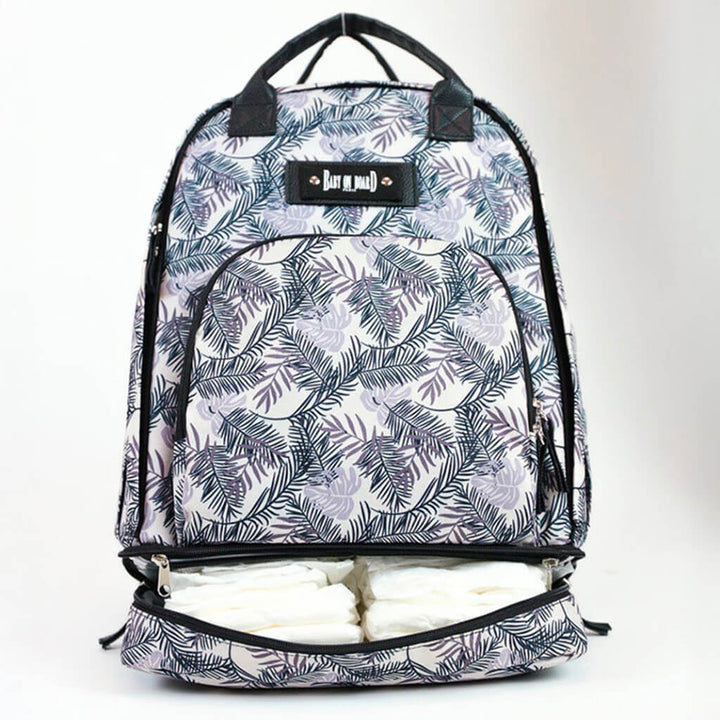 Sac à dos à langer Backpack Baby on Board imprimé tropical, une alternative tendance pour les parents stylés.