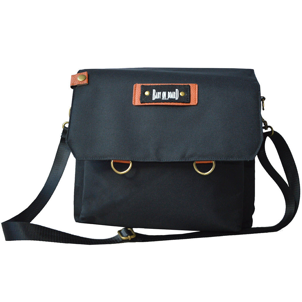 Sac à langer Smart Organiz Black, design élégant avec bandoulière ajustable et détails en cuir.
